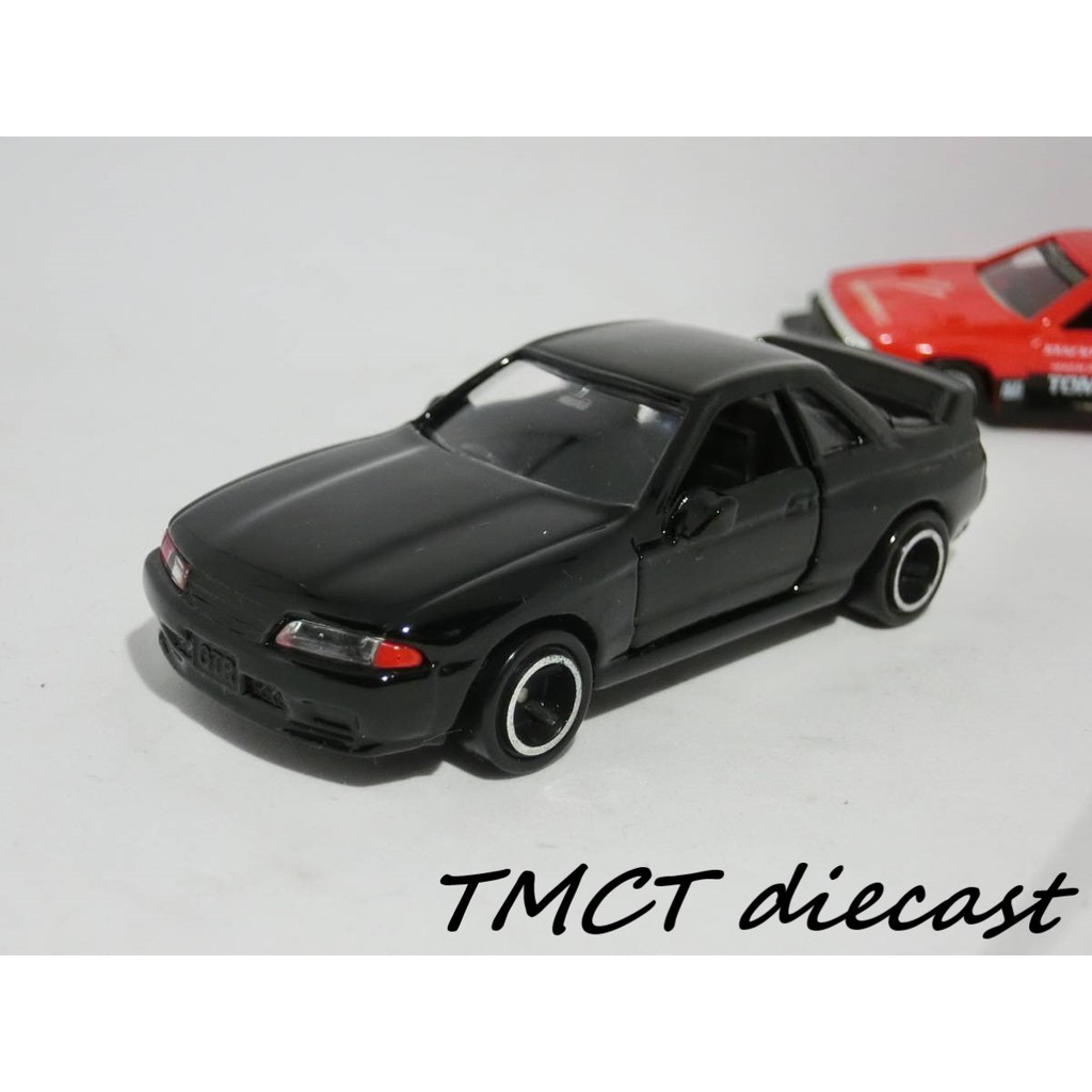 Mô hình 1/64 Tomica Nissan Skyline GT-R No.20 1999 (có gương - đèn nhựa) - Skyline Silhouette Formula Made in China