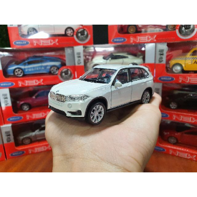 Xe Mô Hình BMW X5 WELLY 1:36 (Trắng)