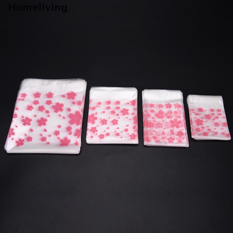 Túi đựng bánh họa tiết hoa anh đào có dán miệng túi.