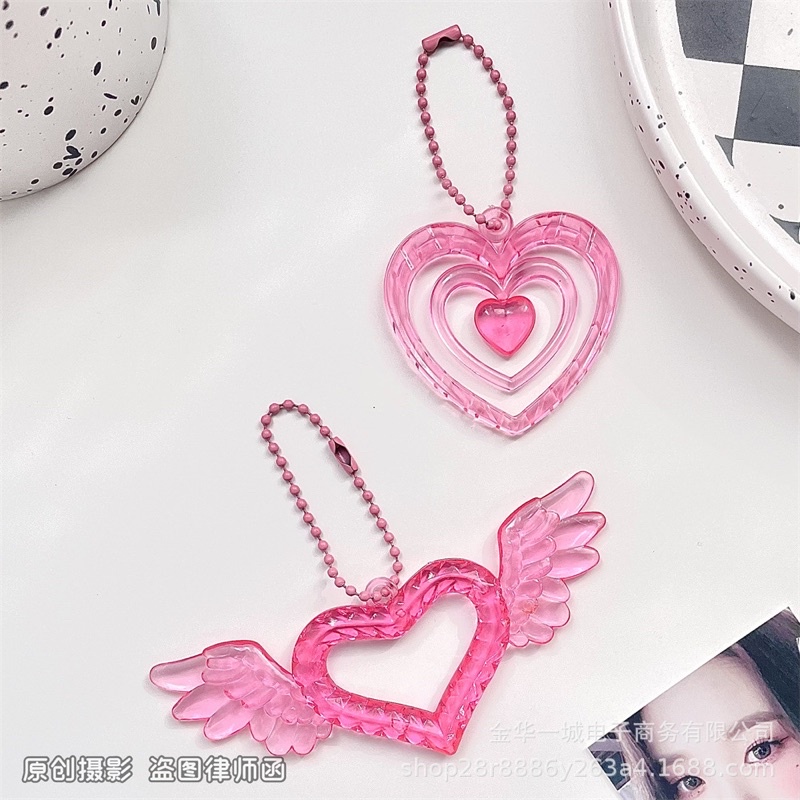 Móc khoá keyring trái tim trong suốt treo collectbook, binder