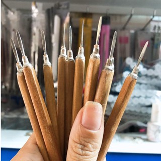 Cây lấy khóe móng cán gỗ