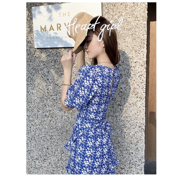 Jumpsuit xanh hoa nhí tà bèo nhún thiết kế