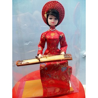 BÚP BÊ NGỒI ĐÀN