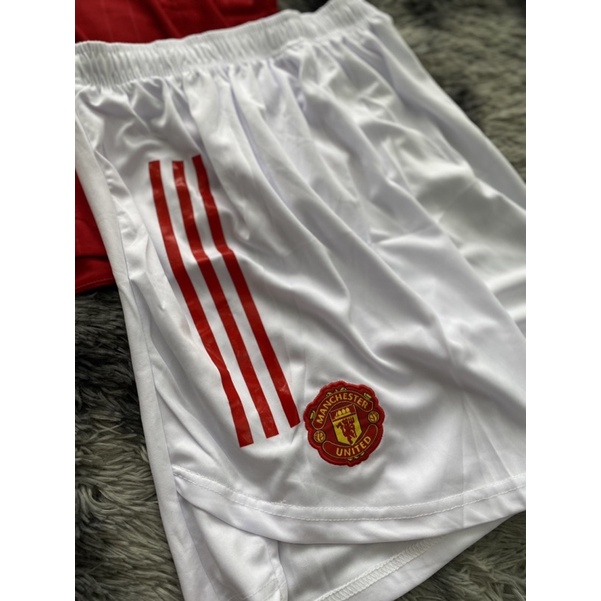 Set bộ quần áo thể thao bóng đá nam nữ clb mu manchester united teroz áo đỏ quần trắng xẻ tà 202: