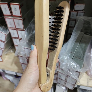 Lược gỗ kẹp là tóc