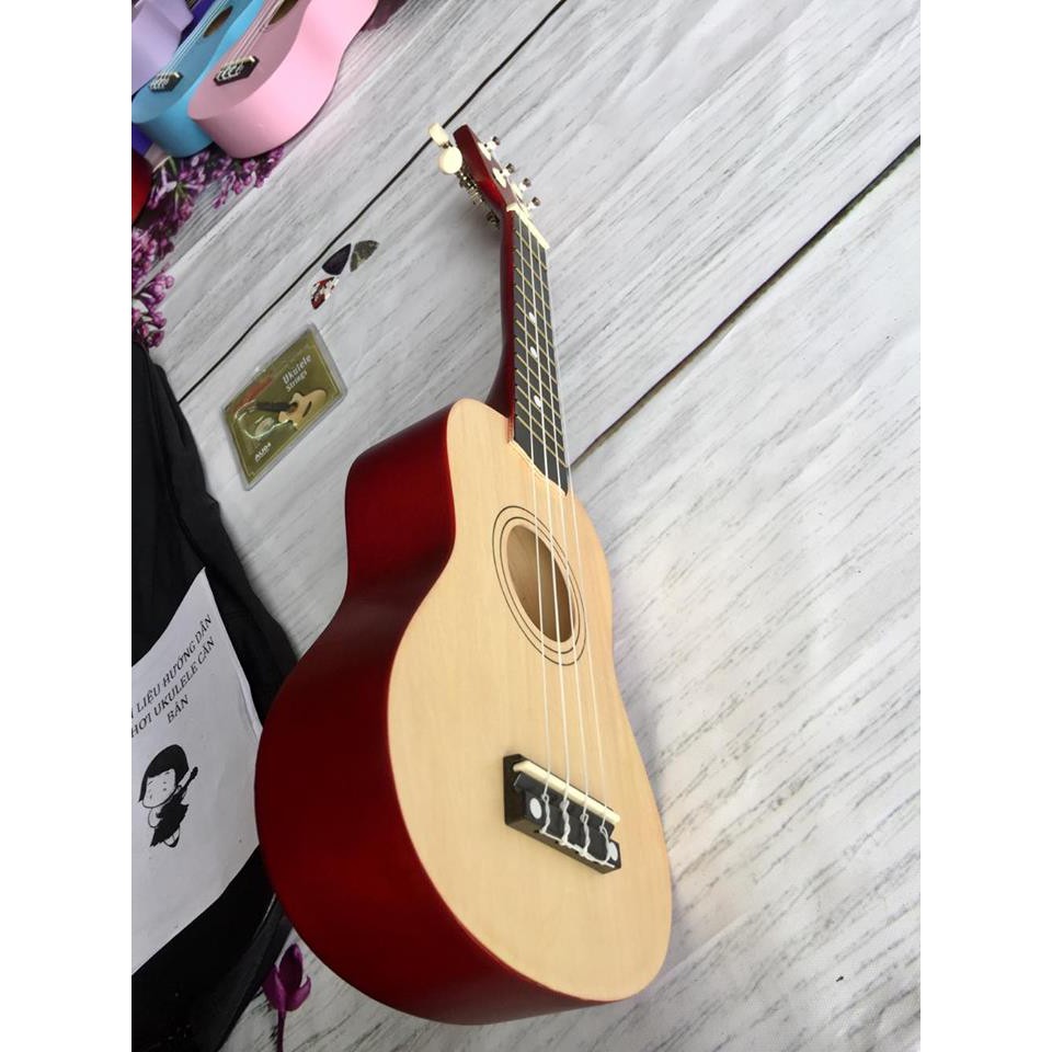 Đàn ukulele cỡ soprano mặt gỗ trắng lưng đỏ cho người mới tập
