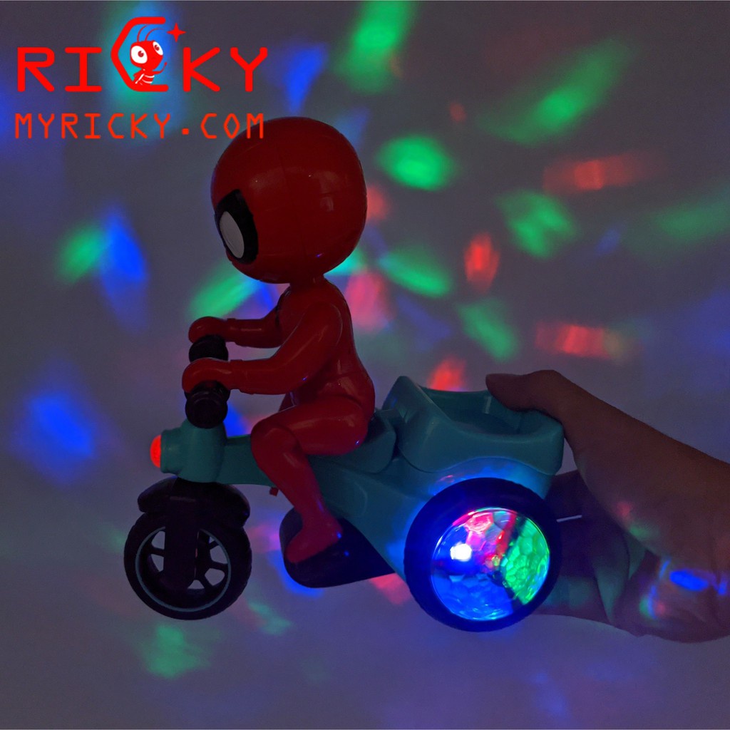 Đồ chơi phát nhạc người nhện đi xe đạp có đèn led và nhạc sôi động