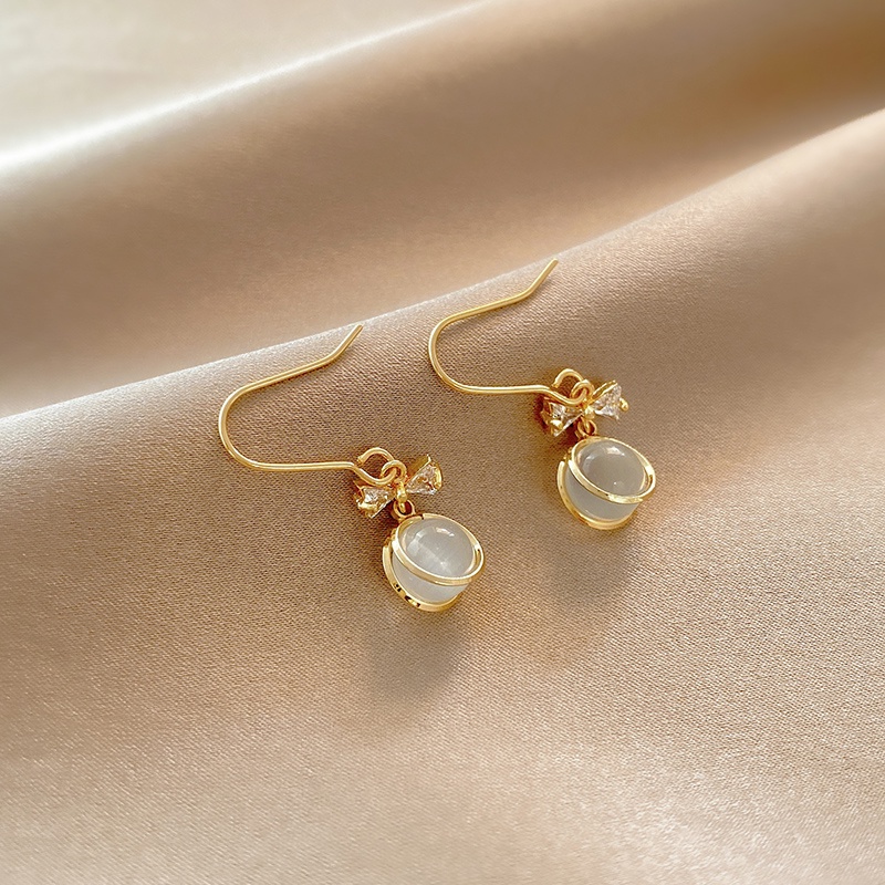 Khuyên tai nơ opal vàng 18K mới