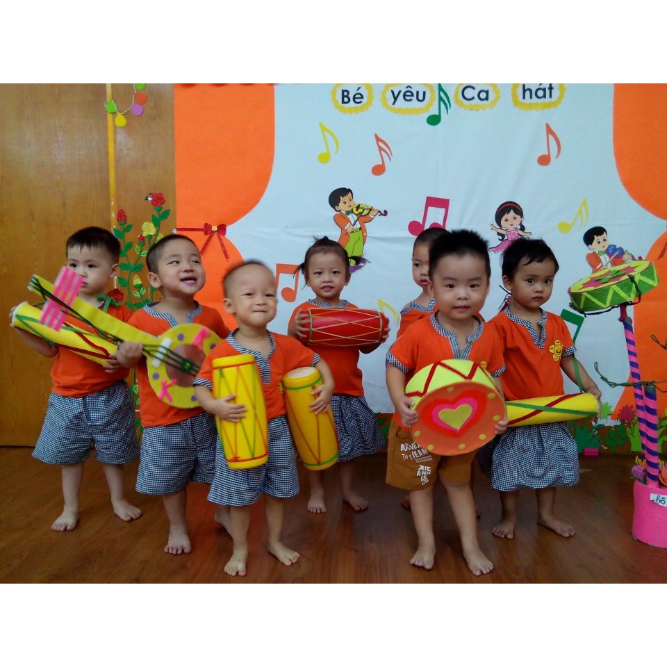 Trống cơm đồ chơi nhạc cụ, màu vàng