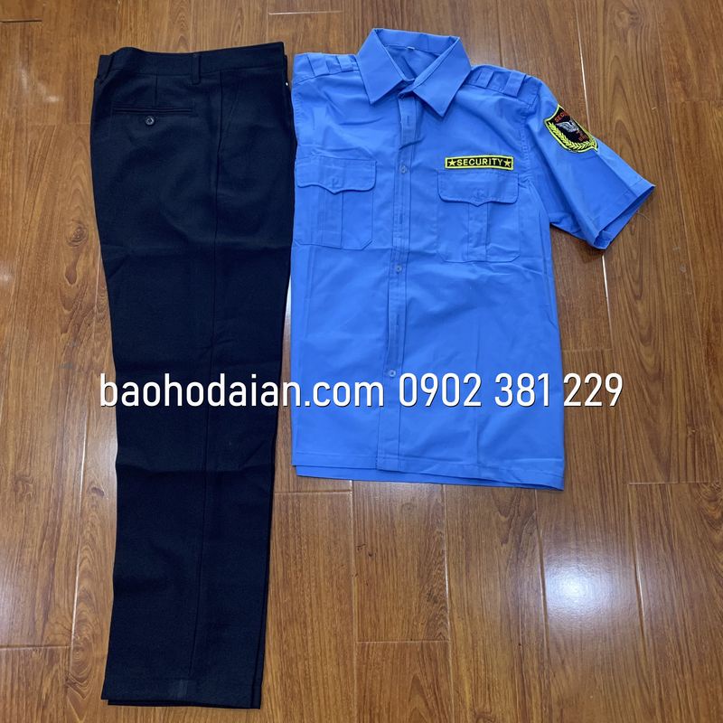 Quần áo bảo vệ màu xanh cộc tay kèm logo tay ngực (quần casme, áo vải xi)