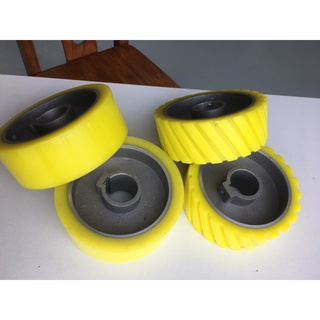 Bánh xe đưa phôi. bánh xe dùng cho máy bào 4 mặt 140*50W*35mm