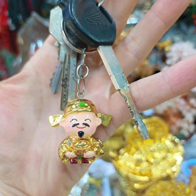 Móc khóa ông Thần Tài mở lộc kích hoạt may mắn