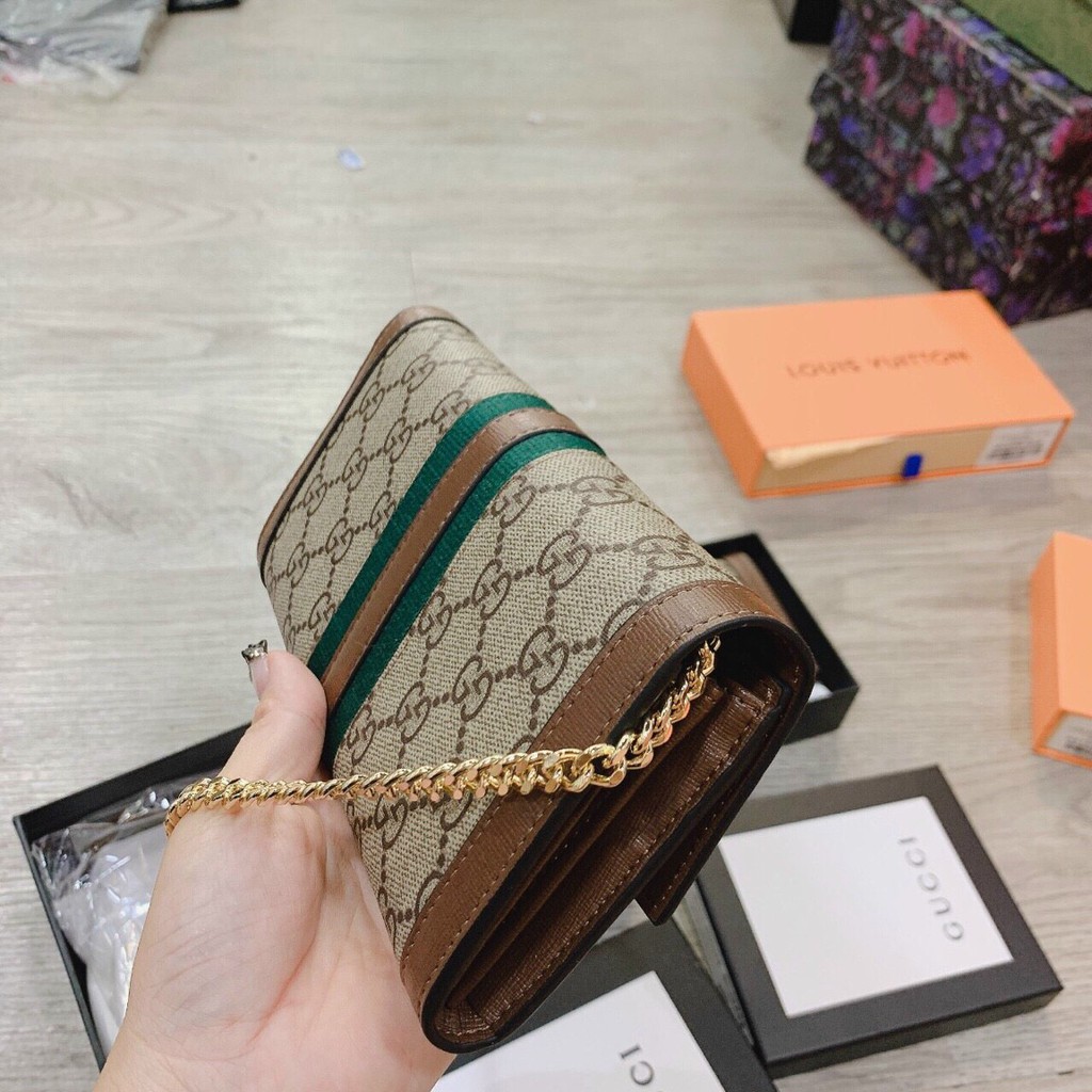 Ví cầm tay Gucci/Clutch cầm tay