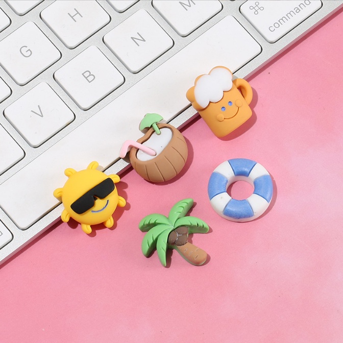 Charm phao, mặt trời, cây dừa, các icon của kỳ nghỉ hè ở biển