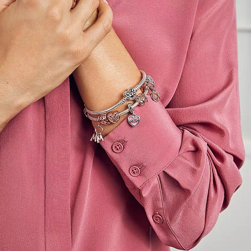 charm pan xỏ ngang đan sợi vàng hồng bạc s925