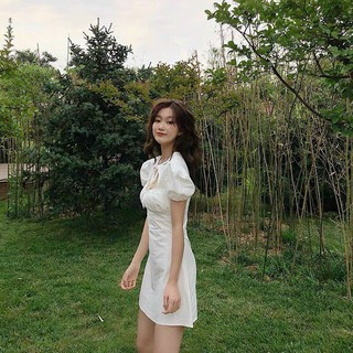 đầm khoét ngực đen trắng