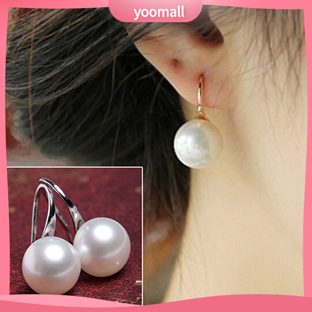 Khuyên tai nữ trang đính ngọc trai tạo hình độc đáo sang trọng