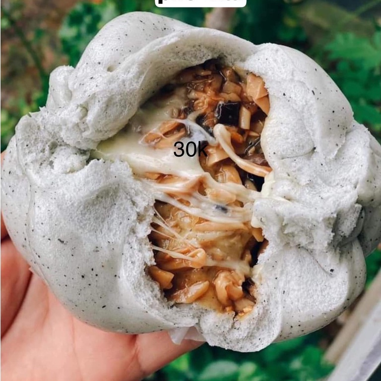 Bánh bao nguyên cám mè đen nấm chay phô mai