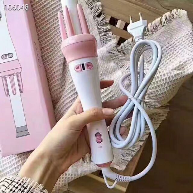 Máy làm xoăn tóc có trục tự xoay