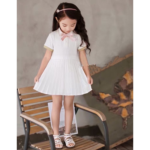 Váy cho bé gái, váy áo polo phối nơ kem phần váy dập ly thanh lịch cho bé