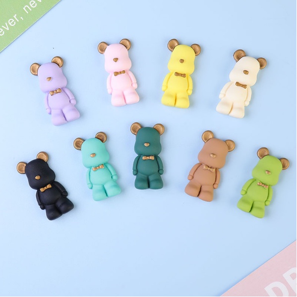 Jibbitz gấu BearBrick bóng mờ nhiều màu gắn dép sục Crocs