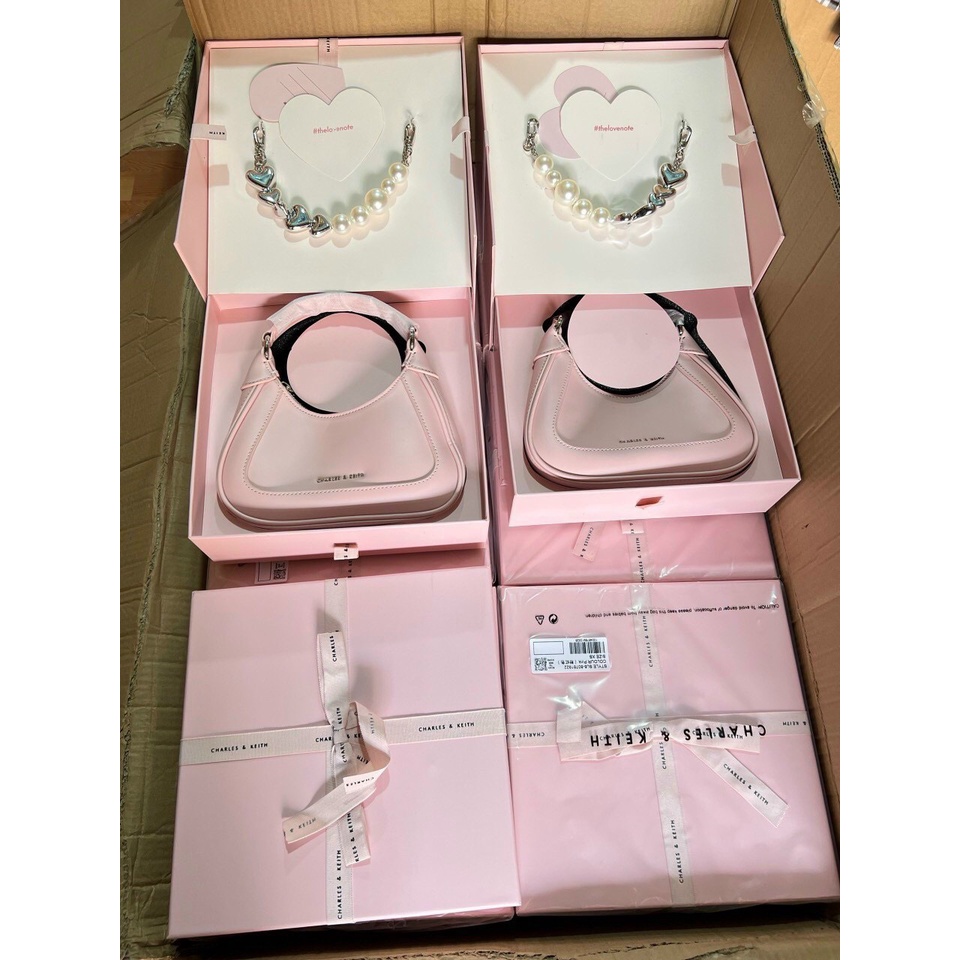 Túi CNK Dáng Bầu Đeo Vai Màu Hồng Baby Kèm Chuỗi Ngọc FullBox