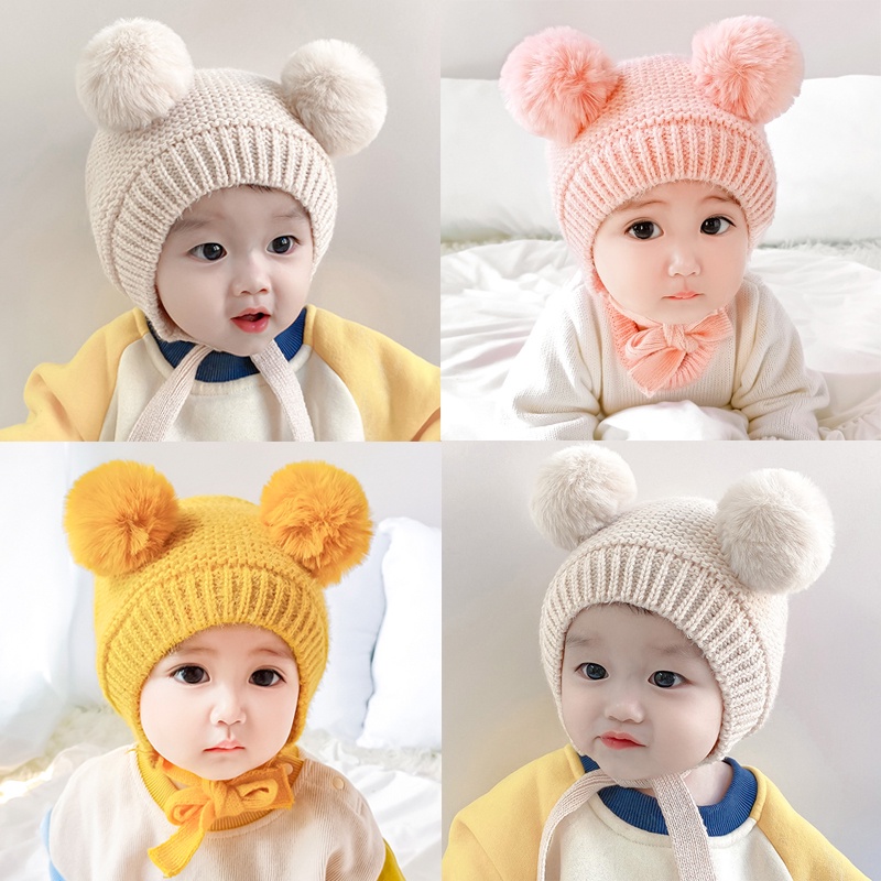Mũ len dệt kim có hai quả cầu lông và dây cột giữ ấm mùa Đông cho bé 3-12 tháng