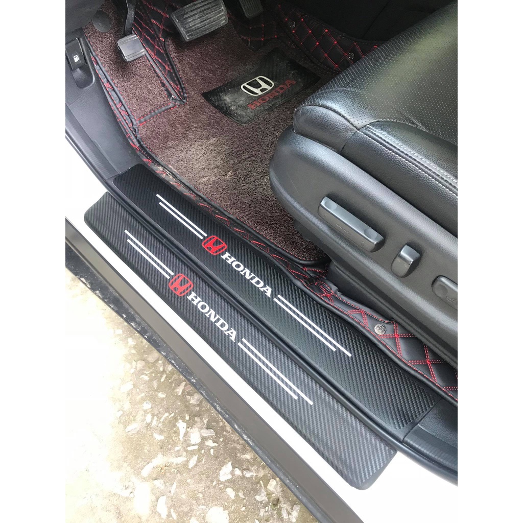 Dán chống xước carbon bậc cửa xe Hơi