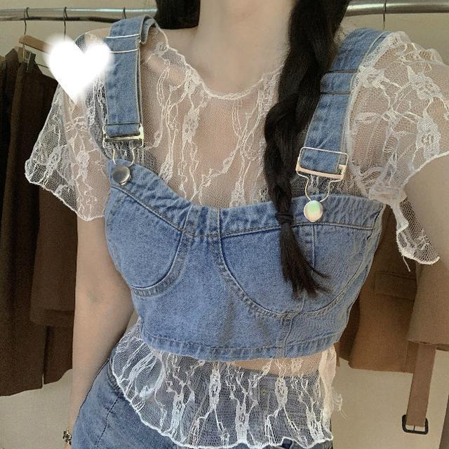 ' suit '- wear a short lace backed sleeveless top over a denim suspender vest