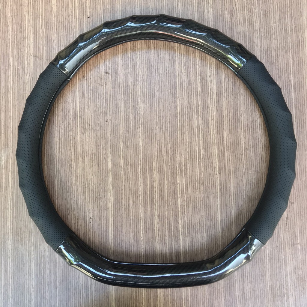 Bọc vô lăng ô tô kiểu dáng dcut cho xe kia seltos, xl7, k5, VFE34, VF8 etriga, sonet,almera, kick, territory, custin