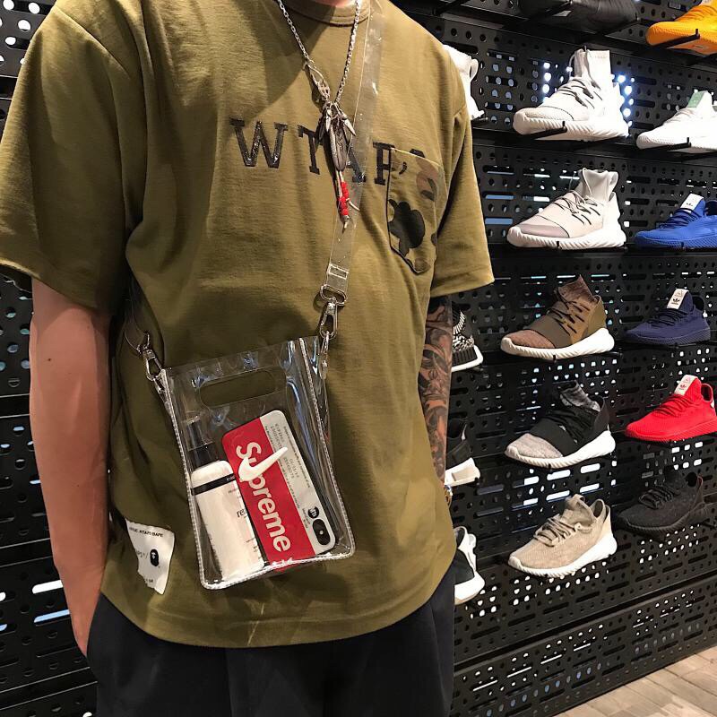 Túi đeo chéo logo Nike mini bằng nhựa PVC Trong suốt 24 * 7.5 * 17 cm kèm 6 ghim cài trang trí