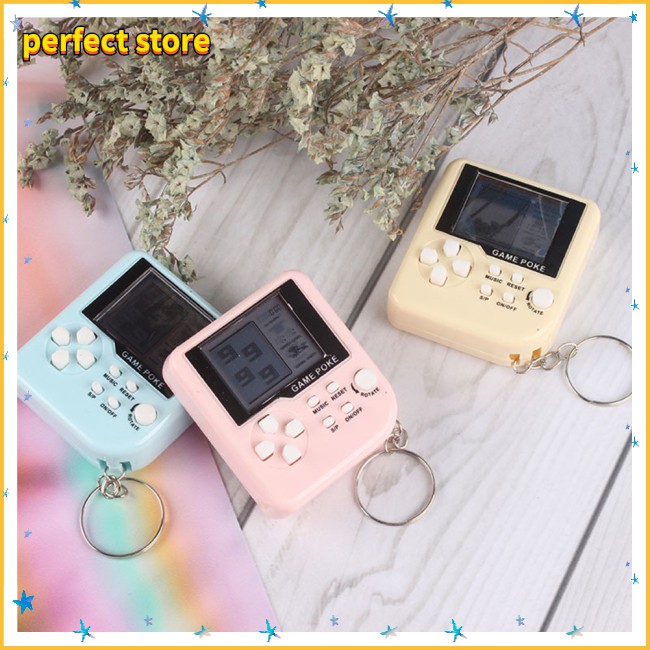 Máy Chơi Game Mini Mang Tính Hoài Niệm Cầm Tay Bỏ Túi Có Gắn Móc Chìa Khóa Trang Trí Xe Hơi Nhiều Màu Khác Nhau