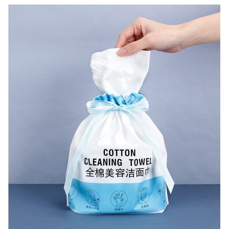 Khăn mặt khô dùng 1 lần lau khô, lau ướt , bông tẩy trang dạng cuộn kèm túi rút