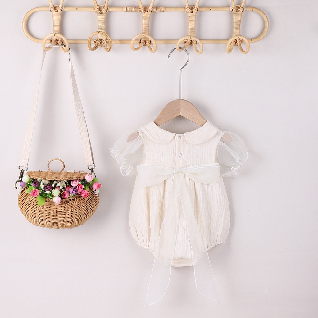 Jumpsuit tay ngắn phối nơ cho bé gái