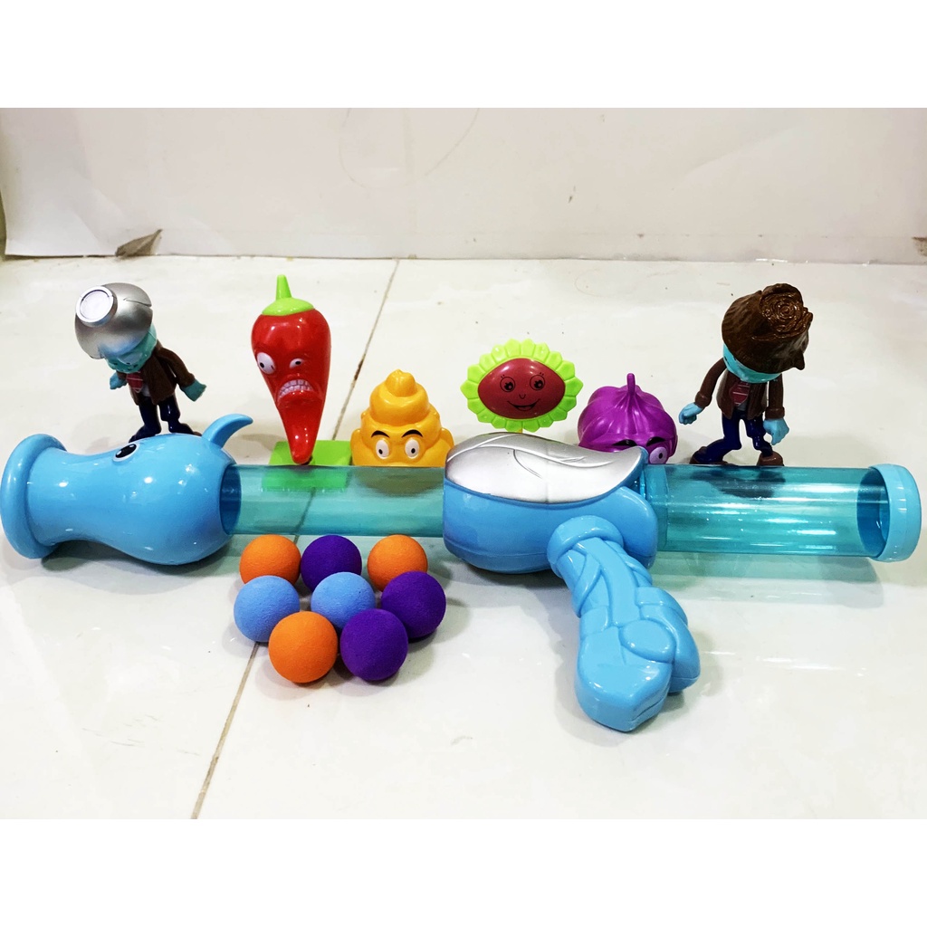 Đồ chơi súng bắn bóng thụt bóng zombie + mô hình zombie