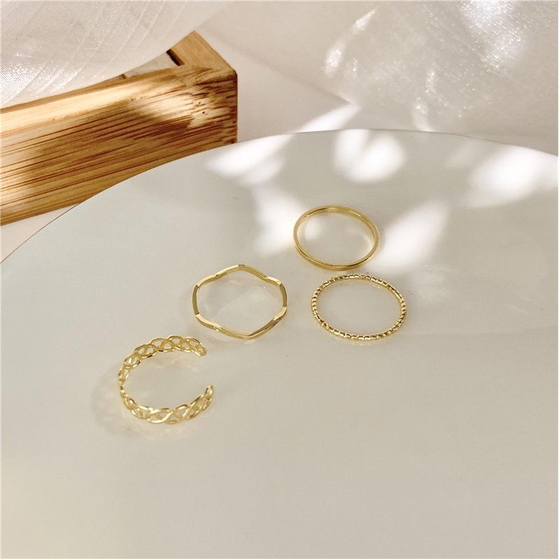 Set 4 nhẫn đeo tay chất liệu kim loại phong cách Hàn Quốc cho nữ