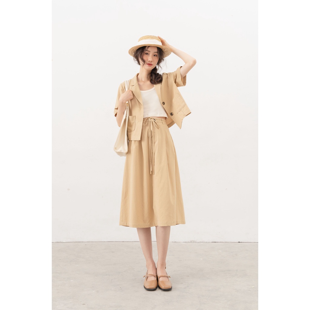 Áo blazer dáng ngắn túi ốp và chân váy mix nơ buộc xanh cốm MADELEN