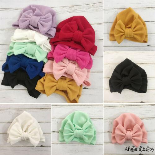 Mũ beanie đính nơ màu kẹo ngọt cho bé