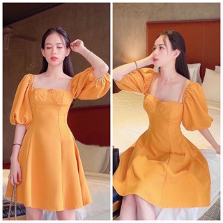 Đầm vàng cam tay lỡ phồng