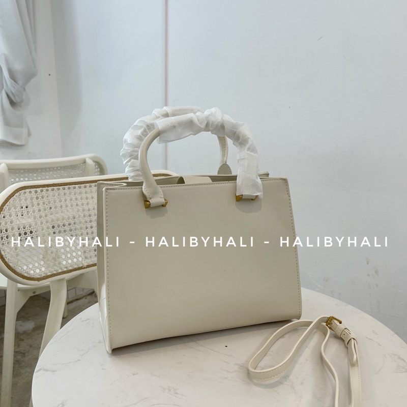 Túi cnk ngăn kéo trước có quai xách