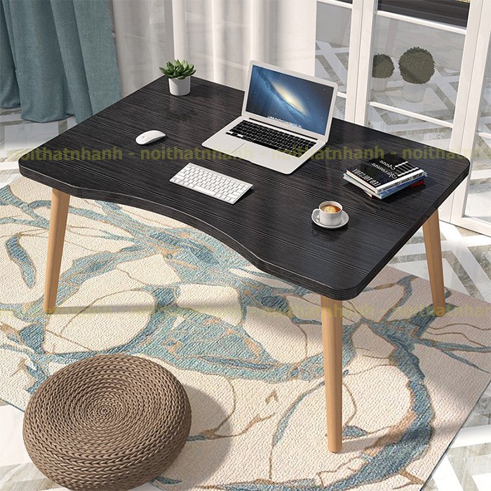 Bàn làm việc cong bệt, mặt bàn cong tạo cảm giac ngồi thoải mái, chân gỗ tiện chắc chắn