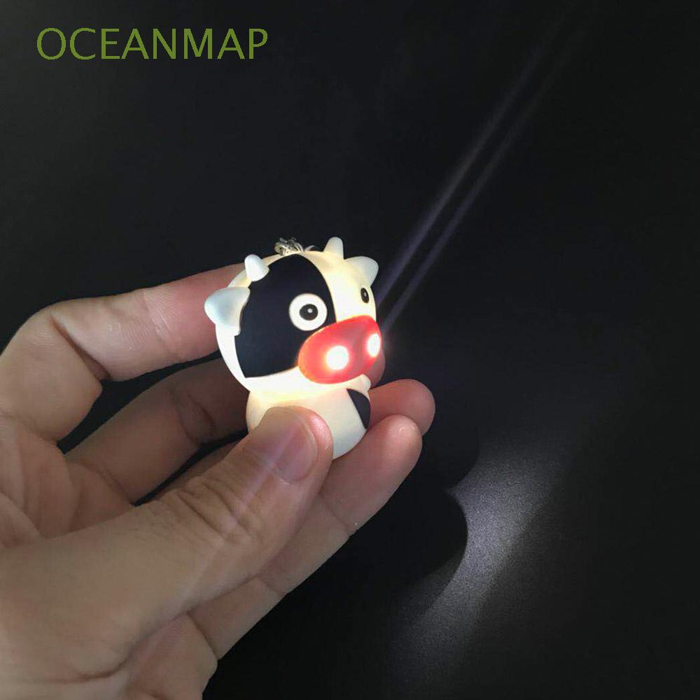 Móc khóa hình bò sữa dễ thương có đèn LED