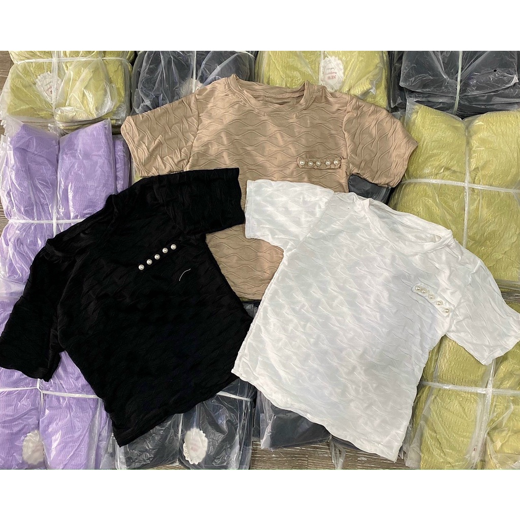 Áo xốp croptop cổ tròn bên ngực đính nút ngọc cực xinh , chất thun xốp mềm mịn