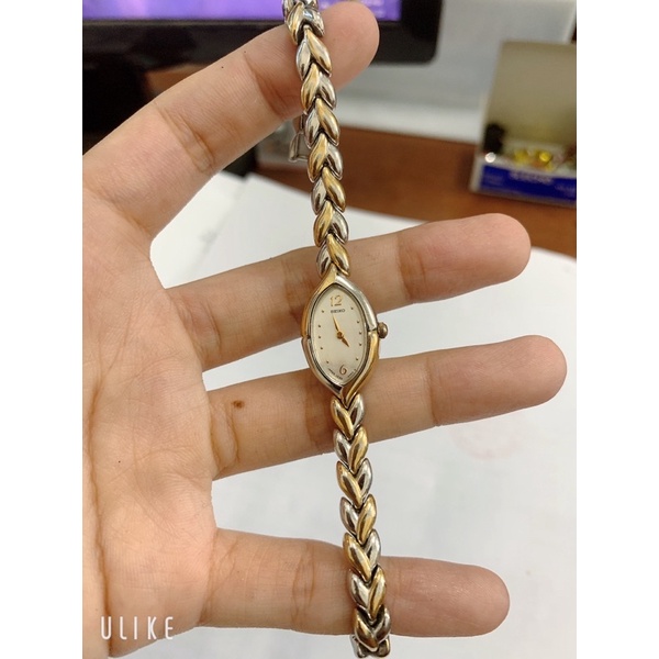 Đồng hồ si nữ hiệu SEIKO, dáng lắc, dây demi, mặt khảm trai