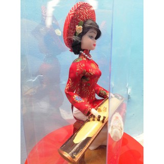 BÚP BÊ NGỒI ĐÀN