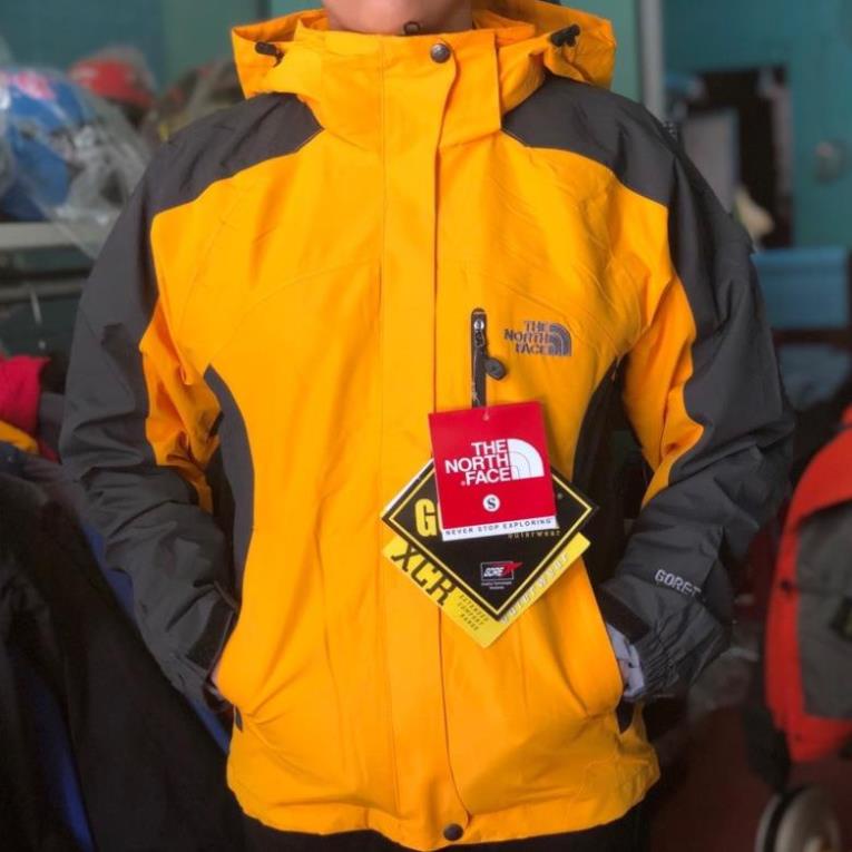 Áo gió cao cấp TNF The North Face 2 lớp hàng Việt Nam xuất khẩu xịn nam nữ chống thấm nước màu vàng 