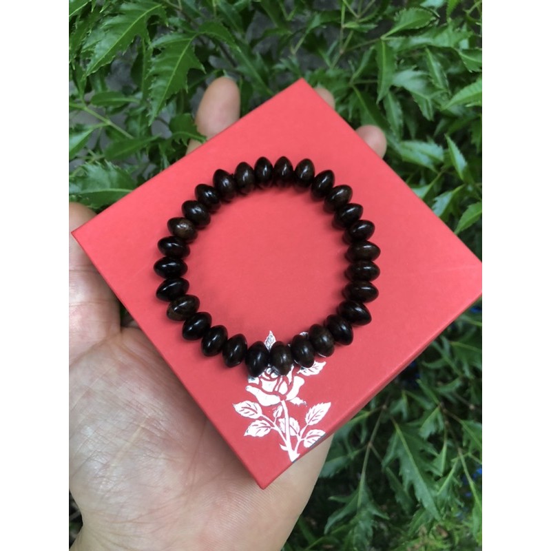 vòng tay gỗ mun vân hạt dẹt