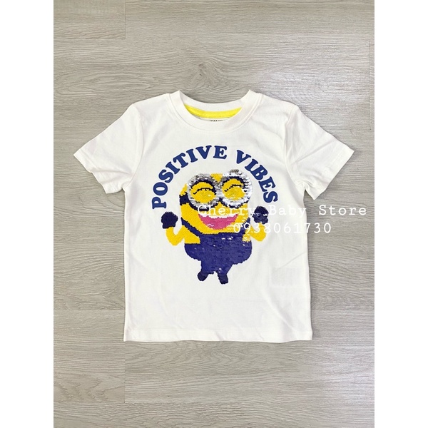 Áo Minnion đính kim sa lật dư xịn cho bé