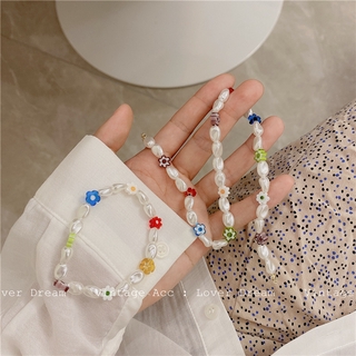 Dây chuyền đính ngọc trai và hoa