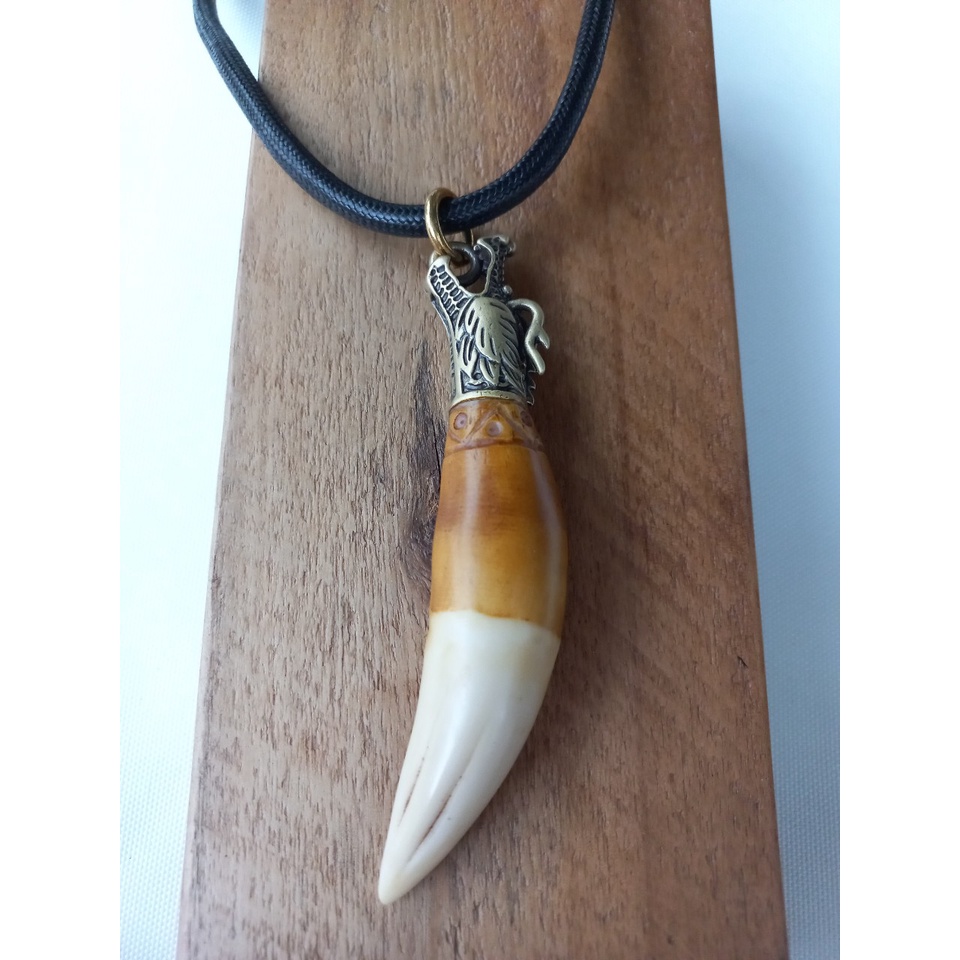 Mặt dây nanh báo nhân tạo đầu rồng